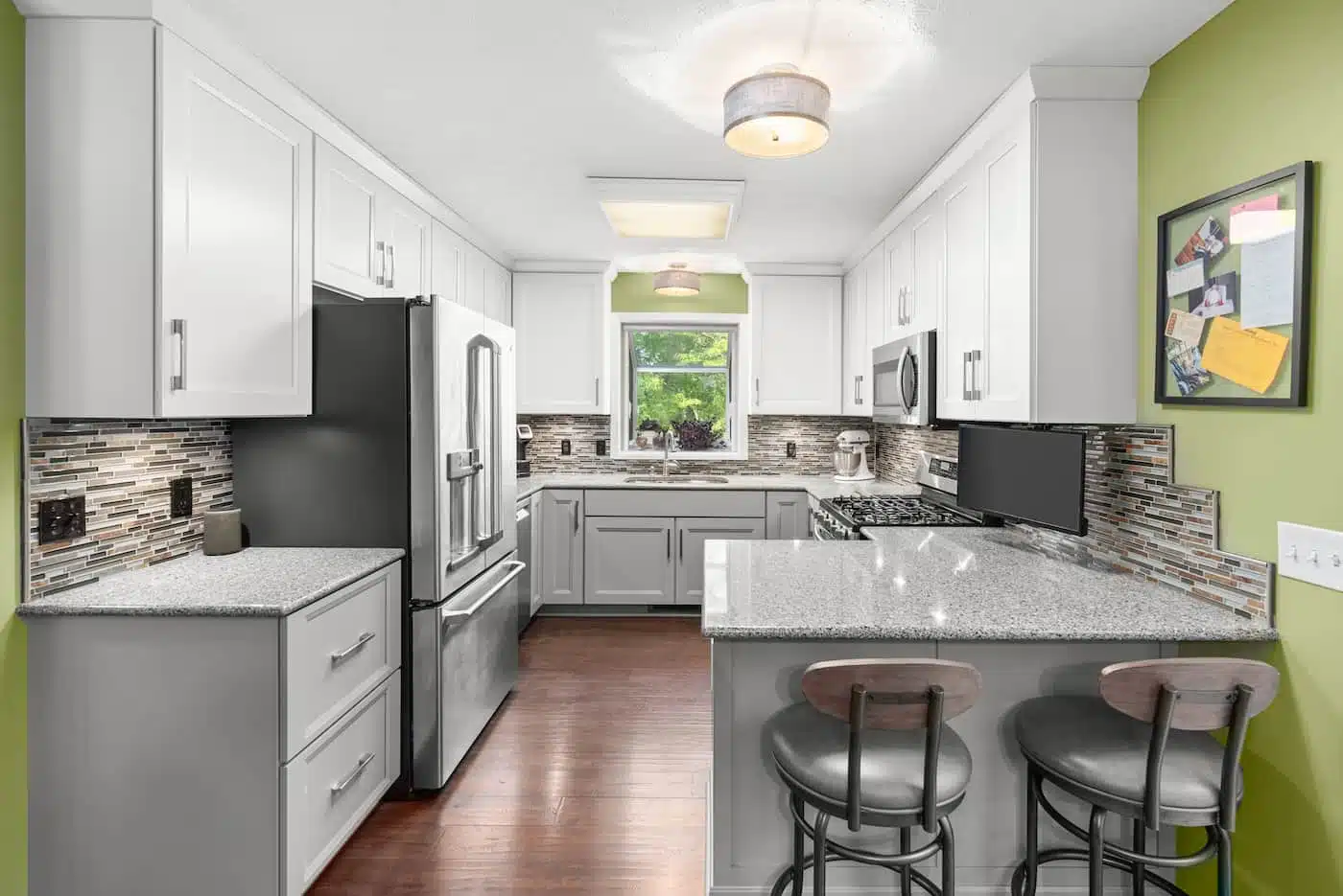 Closeup details of grey and white contemporary classic kitchen designed in modern style cabinets.