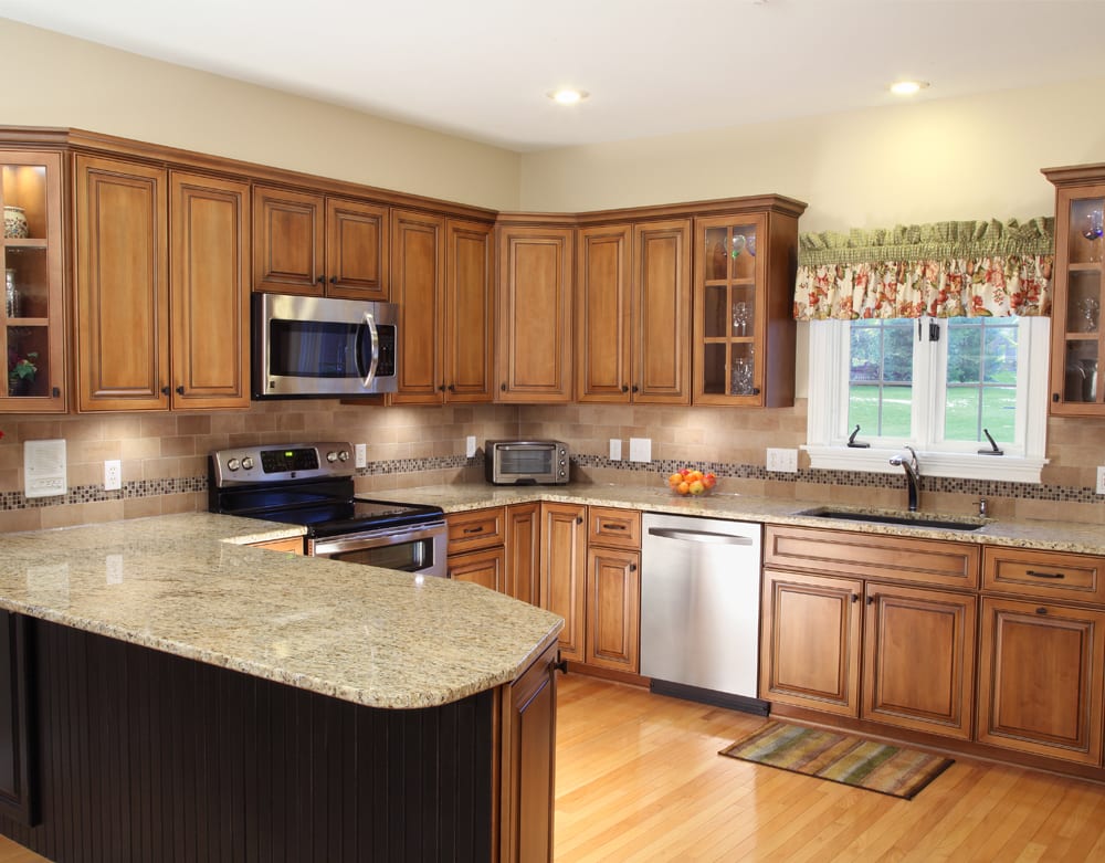 Kitchen with Giallo Ornamental granite countertops