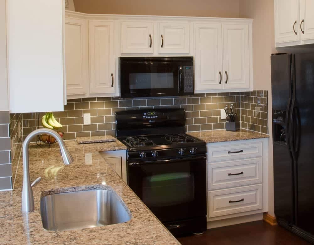 Traditional remodeled kitchen with new flooring and countertops by American Wood Reface