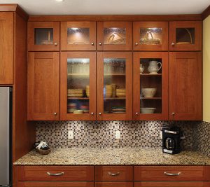 Refaced kitchen cabinets with partial glass doors