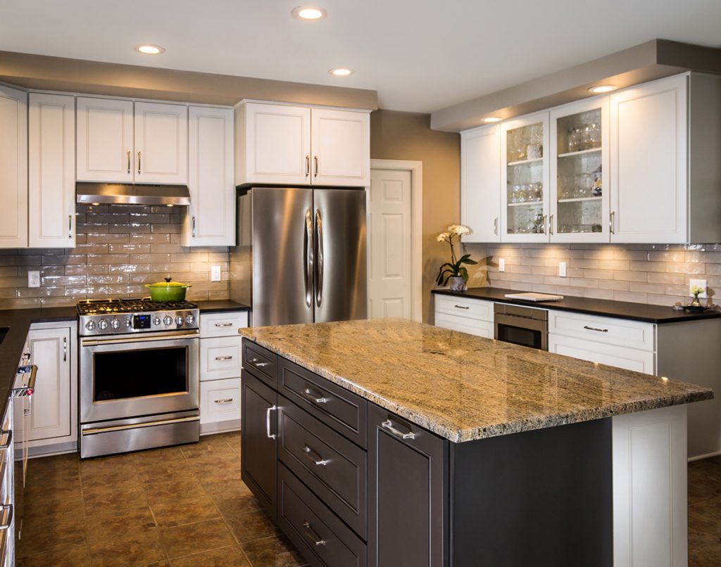 a picture of a beautiful kitchen refacing project with a kitchen cabinet extended to the ceiling with a center island and brown tiled countertops 1