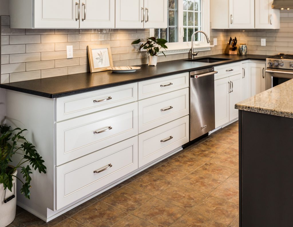 beautiful white kitchen cabinet with long countertops