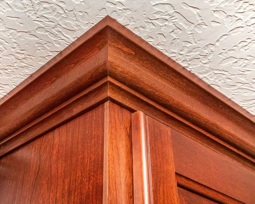 Cherry solid wood kitchen cabinet molding matched to refaced cabinets