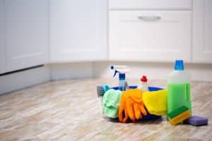 Set of All-Purpose Commercial Cleaners for Cabinet Doors on the kitchen floor 