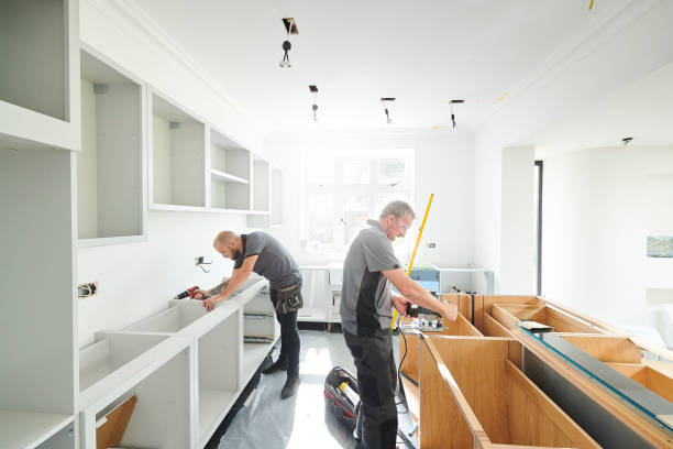 workers doing professional kitchen countertop installation