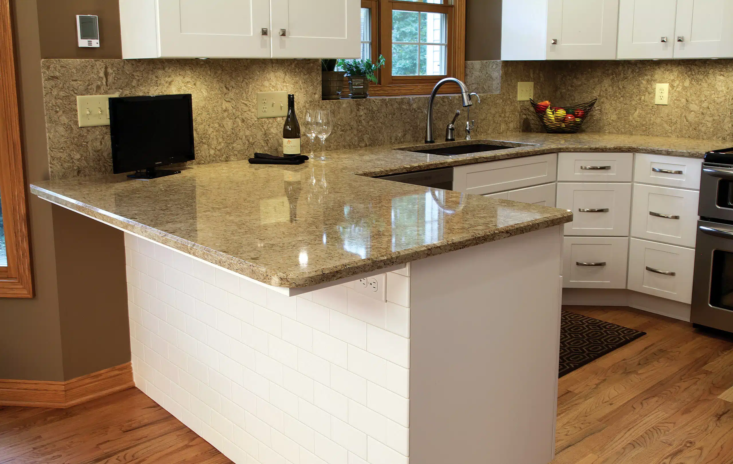 legant kitchen showcasing a Hicks countertop paired with refaced cabinets
