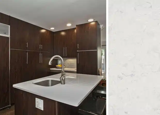 White countertop with dark wood cabinets