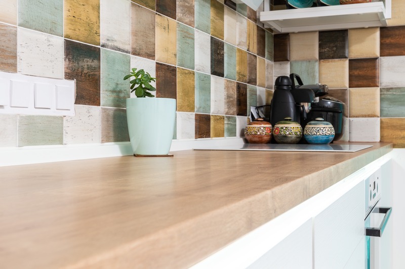 kitchen backsplash with mosaic tiles design.