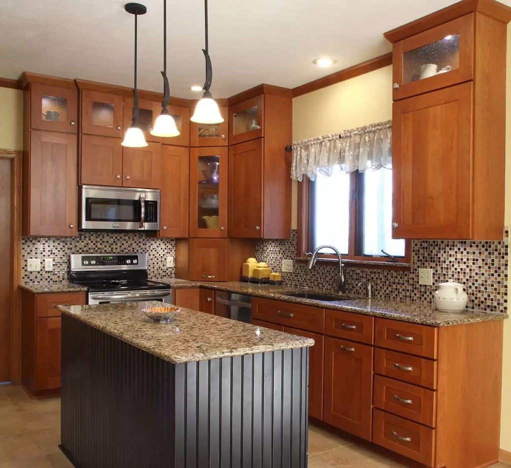 Cherry wood kitchen cabinets.