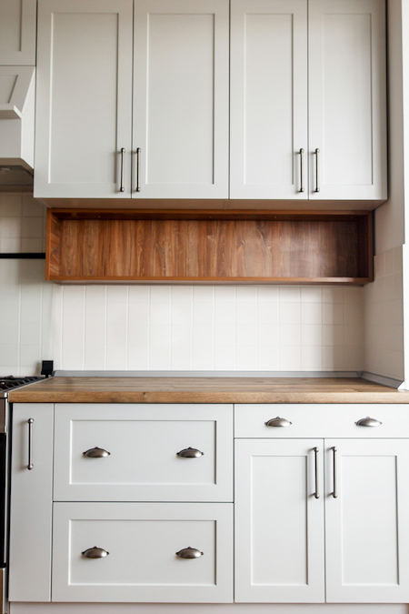 white and brown themed kitchen cabinet