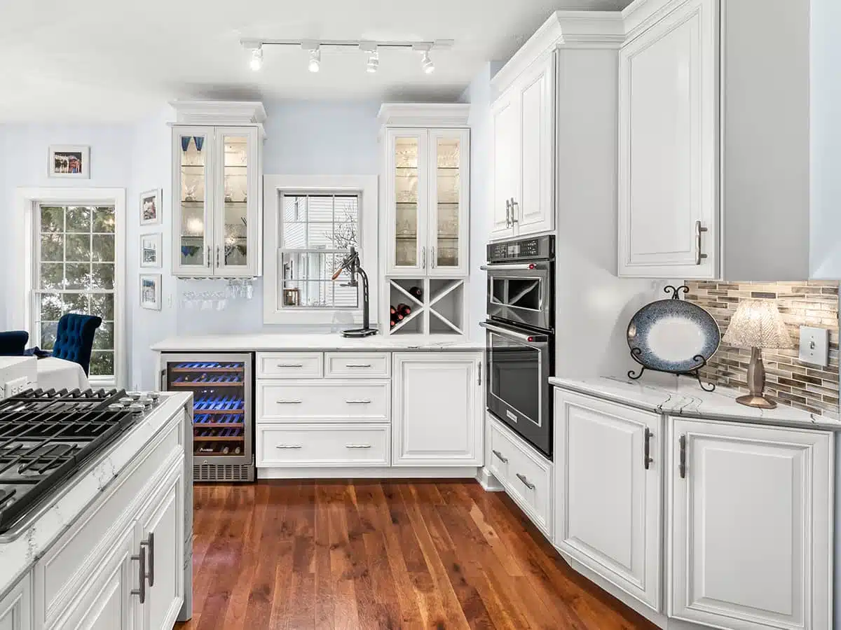 A beautifully refreshed kitchen with newly painted cabinets.