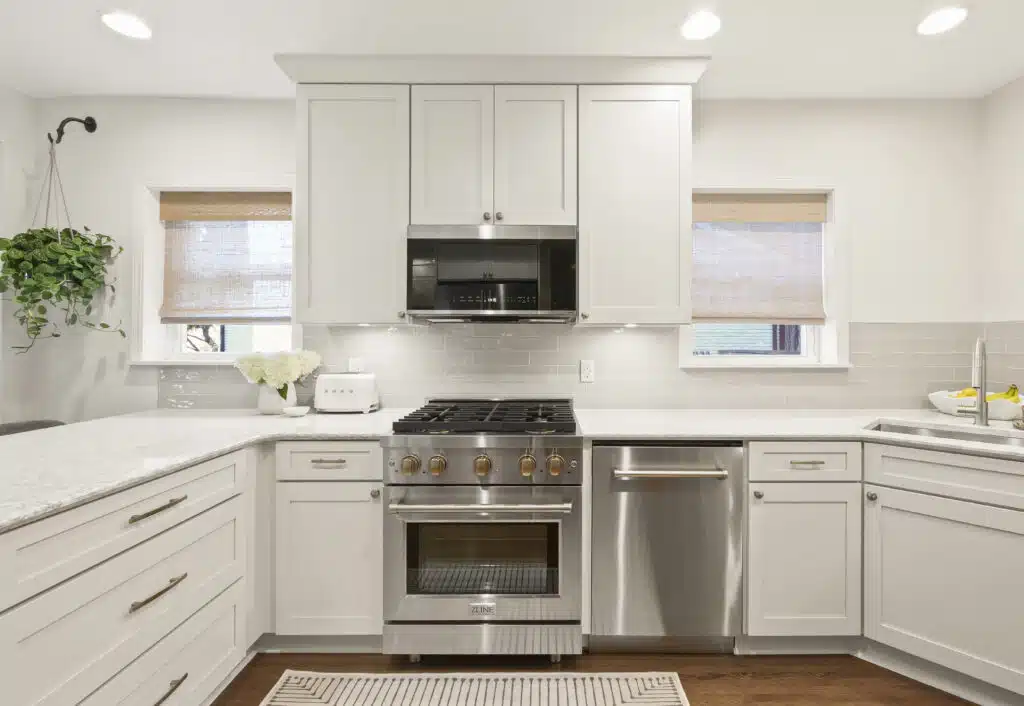 High-end kitchen featuring stove and sink